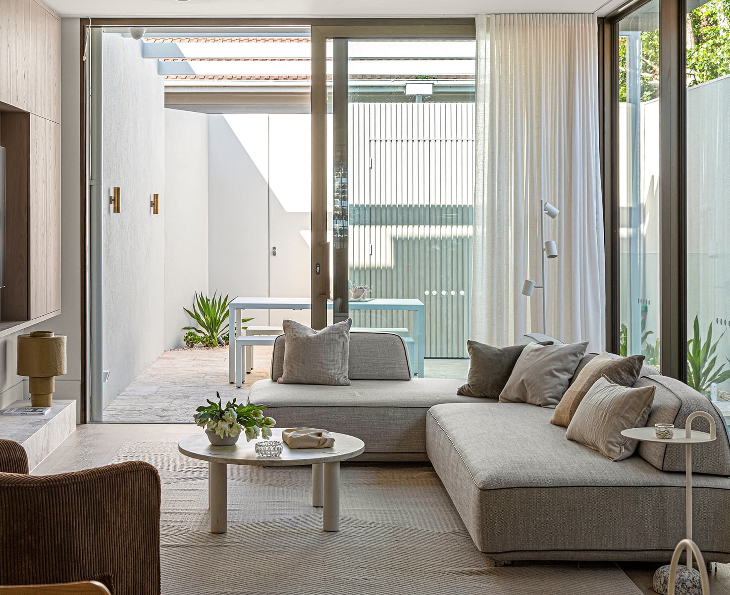 Living room with floor-to-ceiling aluminium glazing